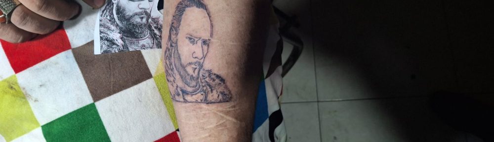 Custom portrait tattoo design by a tattoo artist at Devil Art Studio, Lahore