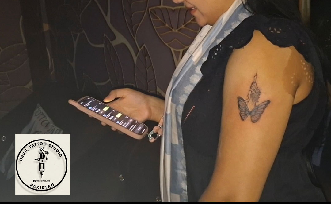 Fine line butterfly tattoo design Lahore