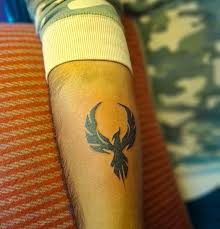 Phoenix bird tattoo on forearm Devil Tattoo Lahore