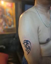 Tribal shoulder tattoo by Devil Tattoo Lahore