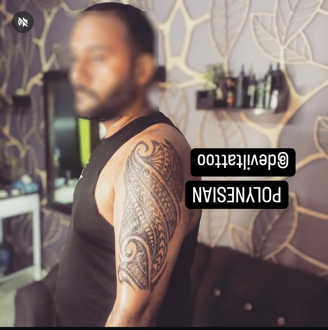 Tribal sleeve tattoo completed at Devil Art Studio for a client from Bahria Town Lahore