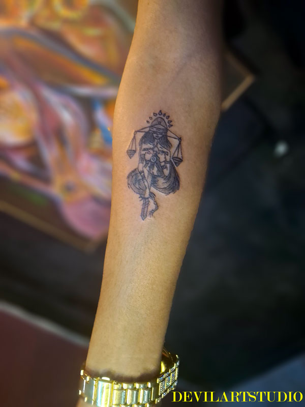 Small zodiac symbol tattoo design reflecting affordable tattoo prices in Lahore