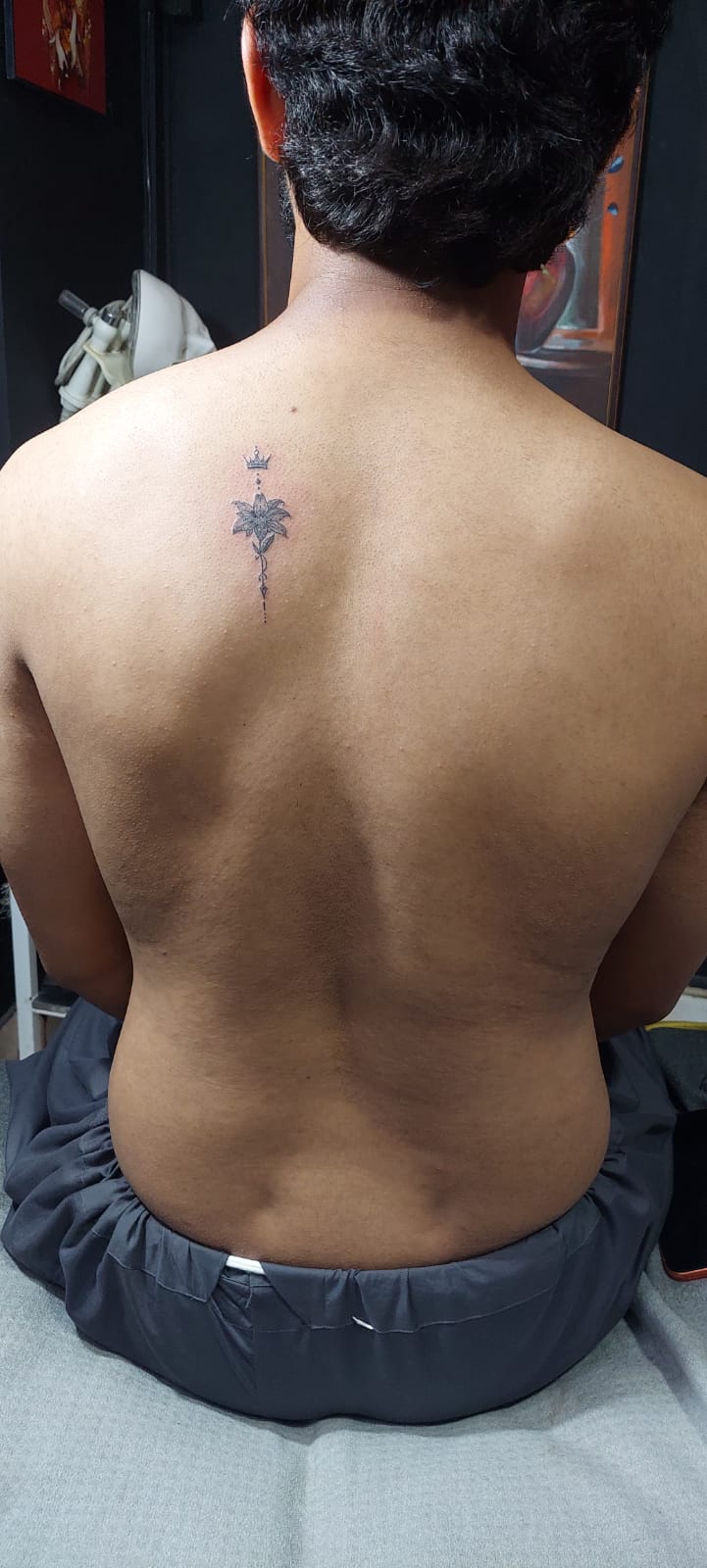 Custom minimalist back tattoo by the top quality tattoo studio in Lahore, Devil Art Studio DHA Phase 7