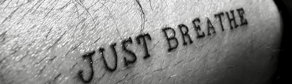 Just Breathe script tattoo lettering by Devil Art Studio tattoo shop in Lahore