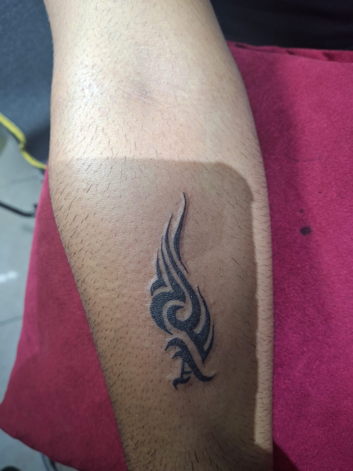 Tribal flame forearm tattoo design - hot tattoo idea by Devil Art Studio Lahore