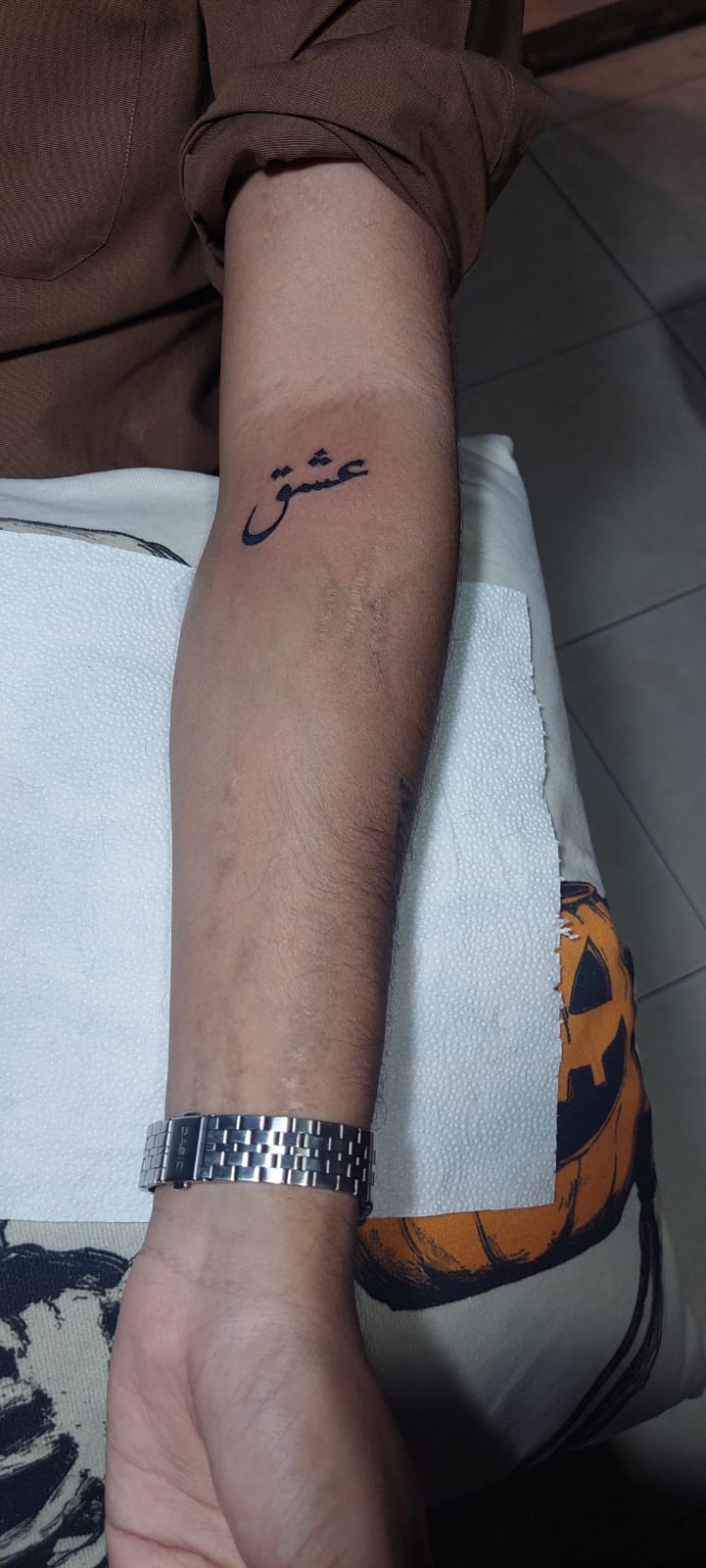 Urdu calligraphy Ishq wrist tattoo by Devil Art Studio Lahore