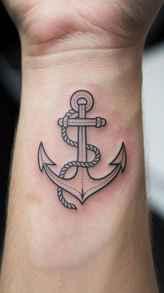 Minimalist anchor line tattoo on wrist by Devil Art Studio Lahore